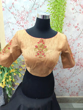 Light orange blouse with red flower embroidery front and back
